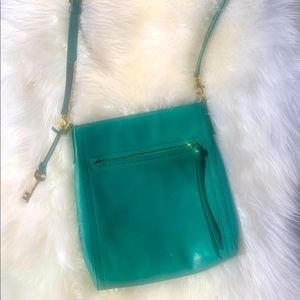 Fossil aquamarine genuine leather purse 9 x 10“Adjustable strap great condition